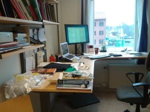 Fig. 1 My messy desk and full download folder.