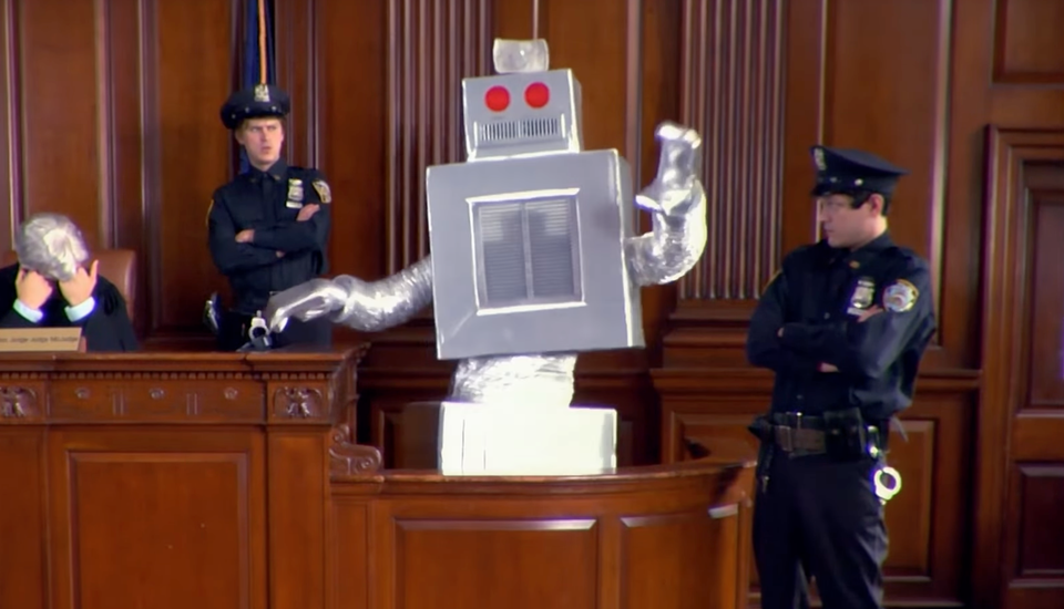 screencap from a video of a cartoonishly silly robot dancing in a whitness stand of a courtroom (from the Whitest Kids U Know sketch comedy troupe's Sex Robot short)
